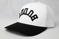 Puck Buddy "BUDDY" Snapback Hat – White & Black